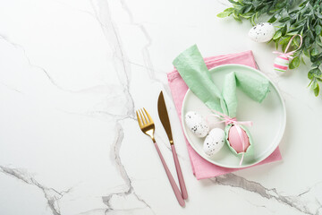 Easter food with decorations on white background.