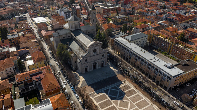Aerial view of Avezzano Cathedral in Abruzzo, Italy. It is a Roman Catholic cathedral dedicated to Saint Bartholomew. It has a travertine facade in the Neo-Renaissance style overlooking the square.