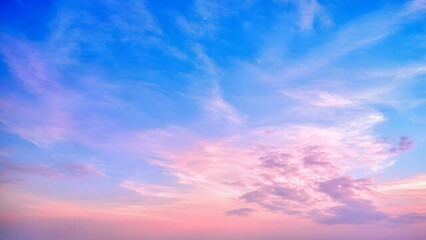 Obraz premium fantasy blue sky filled with soft pastel-colored clouds