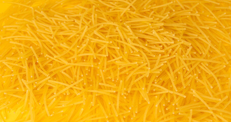 Raw vermicelli textured background, gold soup pasta pattern, small homemade noodles mock up