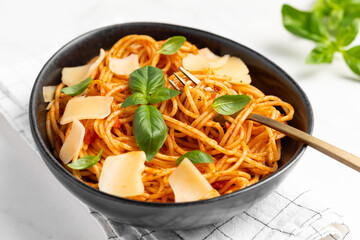 pasta with tomato sauce, parmesan and basil