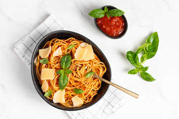 pasta with tomato sauce, parmesan and basil