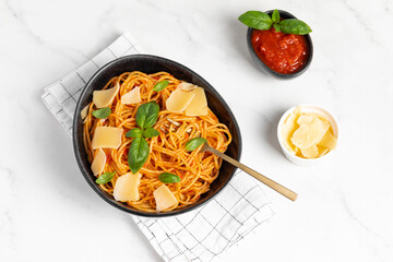 pasta with tomato sauce, parmesan and basil