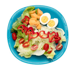 Salad in blue dish isolated on transparent background.