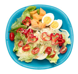 Salad in blue dish isolated on transparent background.