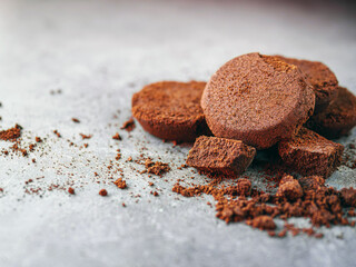 Close-up of coffee grounds from espresso machine. coffee ground on gray background