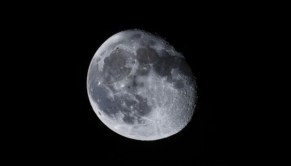 Fototapeta premium Close-up of intricate lunar surface details during a partial lunar eclipse, dramatic lighting, astronomical observation, high-detail space imagery