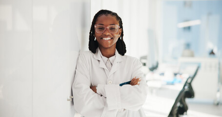 Portrait, science and black woman in lab, arms crossed and researcher with confidence. Face,...
