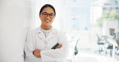 Portrait, science and Asian woman with arms crossed, medical research and empowerment. Smile,...
