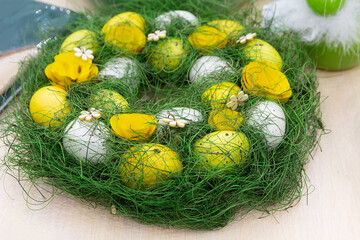 Easter eggs in a green nest.
