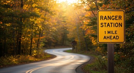 Driving Scenic Autumn Road Toward Ranger Station with Golden Sunlight