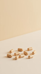 Image of a cluster of white magnesium glycinate capsules on a table with a gradient background.