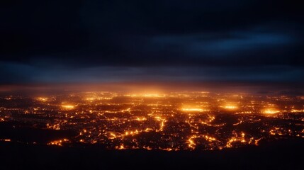 A breathtaking nighttime aerial view of a vibrant cityscape illuminated by countless lights against a dramatic dark sky.