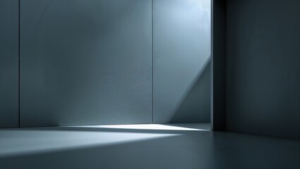 Light entering a minimalistic room with sleek walls and floor during daytime creates distinct shadows and highlights