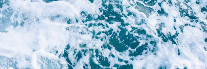 Abstract blue background with sea foam. Panoramic photo
