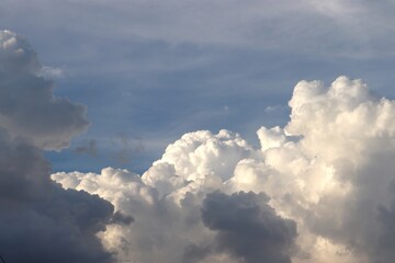 A close-up of the cloudy sky. Color background. Soft shapes. Simple composition. Abstract environment. Atmosphere of presence. Picture. Wallpaper. Poster. Postcard. Place to insert