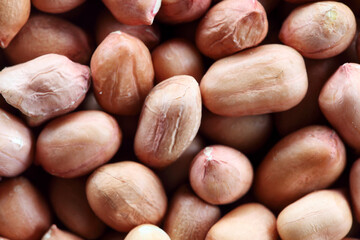 Close-Up of Raw Peanuts with Smooth Shells and Natural Texture