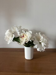 Little bouquet of a white peonies