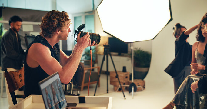 People, photographer and model for photoshoot in studio of photography, fashion magazine and backstage. Team, camera and picture of filming production, spotlight and media agency of creative industry