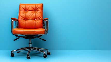 Fototapeta premium Orange Executive Office Chair with Button-Tufted Leather and Chrome Armrests