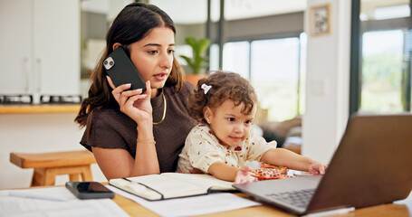 Laptop, multitask or phone call with mother and baby in home for development of small business....