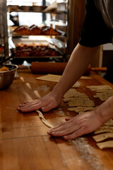 Artisan Baker Preparing Twisted Breadsticks Dough