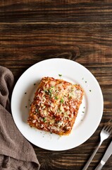 Lasagna with ground beef, ricotta cheese and tomato sauce