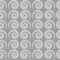 Seamless elegant white pattern of spiral meander on light gray background. Oriental or Greek style for typography, printing on fabric, curtains, scarves and stoles of clothes and interior