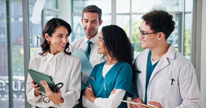 Happy people, doctor or meeting with tablet for medical research, discussion or development at hospital. Group, employees or healthcare workers with smile on technology for online app or telehealth