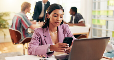 Browsing, student and woman with smartphone, classroom and preparing for exam with info, laptop and education. Learning, scholarship and people in college with tech, typing and serious for knowledge