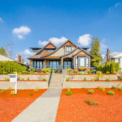 Two story luxury house with beautiful summer  landscape in Vancouver, Canada, North America. Day time on June 2024