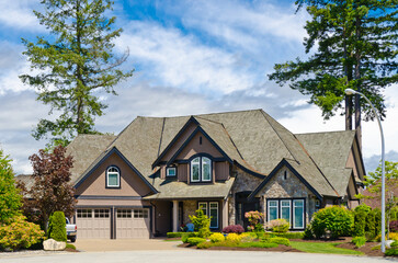 Two story luxury house with beautiful summer  landscape in Vancouver, Canada, North America. Day...