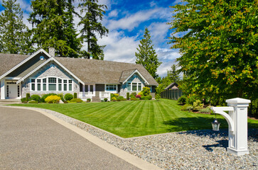 Two story luxury house with beautiful summer  landscape in Vancouver, Canada, North America. Day...