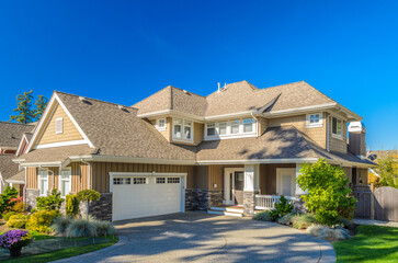 Two story luxury house with beautiful summer  landscape in Vancouver, Canada, North America. Day...