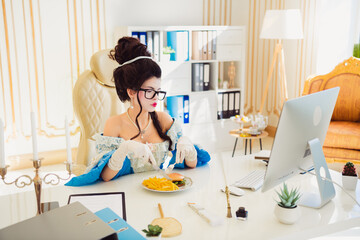 Elegant woman in historical costume with modern accessories and a computer in a luxury office blending vintage style with modern elements