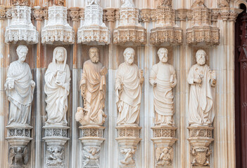 Close up of saint stone statues in Batalha monastery. Intricate details from portuguese gothic architecture
