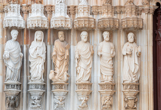 Close up of saint stone statues in Batalha monastery. Intricate details from portuguese gothic architecture