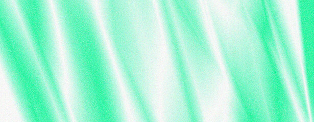 Soft green fabric drapes gracefully under gentle lighting, creating a serene atmosphere. The subtle folds add texture and depth, enhancing the tranquil space for artistic endeavors
