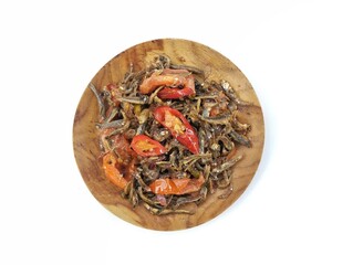 Fried anchovies on plate isolated on white background 