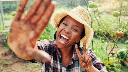 Portrait, dirty hands and black woman in garden, peace sign and nature with ecology, vegetables and muddy. African person, outdoor or girl with soil, spring and environment with agriculture or symbol