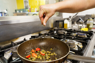 Seasoning Vegetables in a Frying Pan