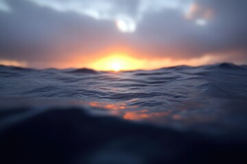 Obraz premium Stunning sunset over the ocean. Close-up view of the water's surface