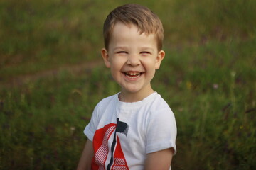 Adorable little boy smiling at camera