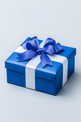 Obraz premium Blue gift box with white ribbon and blue bow