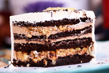 A slice of cake on a plate, ready to be served.