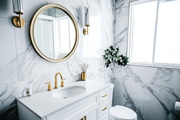 Modern bathroom with marble and gold accents.  A clean, spacious bathroom features a round gold-framed mirror, gold fixtures, a white vanity with marble countertop, and a potted plant.
