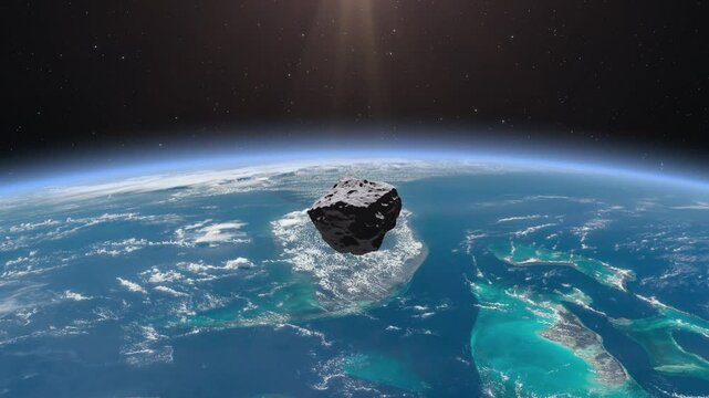 An asteroid falls to Earth. Dangerous approach of an asteroid to planet Earth. Asteroid or meteorite and Earth. 