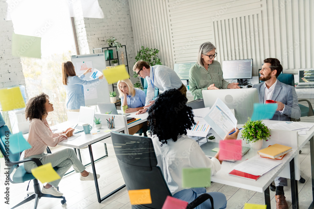 Aufkleber diverse team working in modern office with collaborative atmosphere and focus on project planning an
