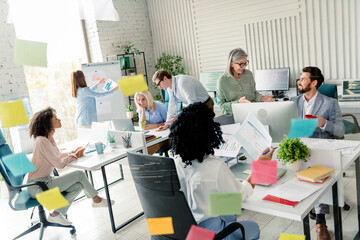 Diverse team working in modern office with collaborative atmosphere and focus on project planning and teamwork