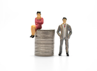 Miniature doll toy of a person and a coin